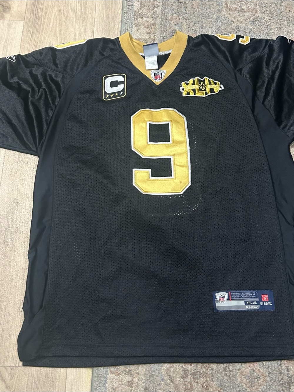 Reebok Black and Gold Men’s #9 Football Jersey